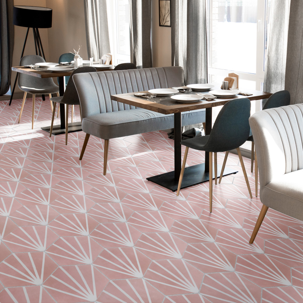 Modern kitchen floor adorned with Horizon Dusk Hex Rosa tiles accentuating the star design on pink background.