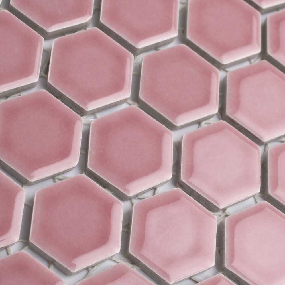 Detailed view of the Tribeca 1" Hex Glossy Blush tiles showcasing the intricate hexagonal design in a rich pink shade.